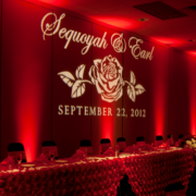 monogram and red uplighting